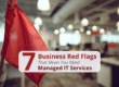 Red flag in a business office with text that says "7 Business Red Flags That Mean You Need Managed IT Services"