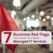 Red flag in a business office with text that says "7 Business Red Flags That Mean You Need Managed IT Services"
